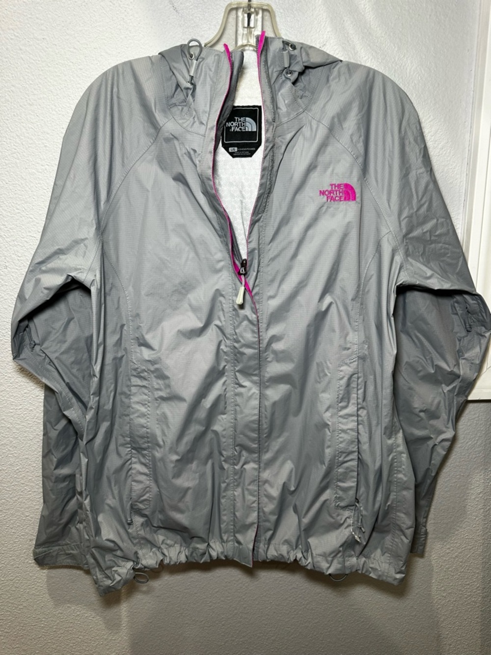 The North Face HyVent rain jacket with pink accents